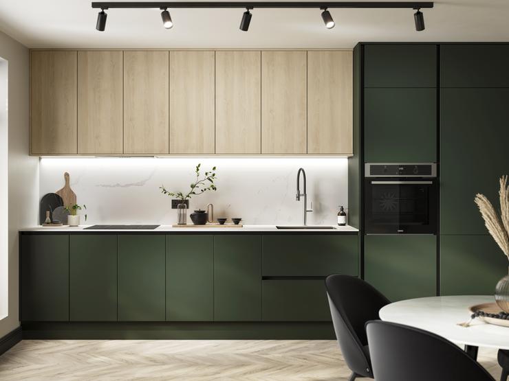 A single-wall kitchen with green cabinets. Includes a white worktop, induction hob, and oak wall cabinets.