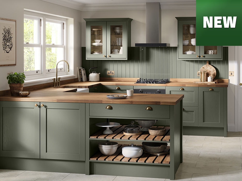 Contemporary green kitchen with cabinetry, built-in appliances, with new logo