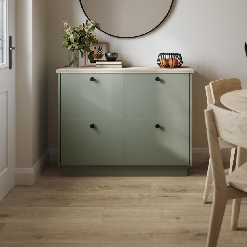 Howdens Professional V Groove Oak Laminate Flooring with a Greenwich Reed Green Base Unit