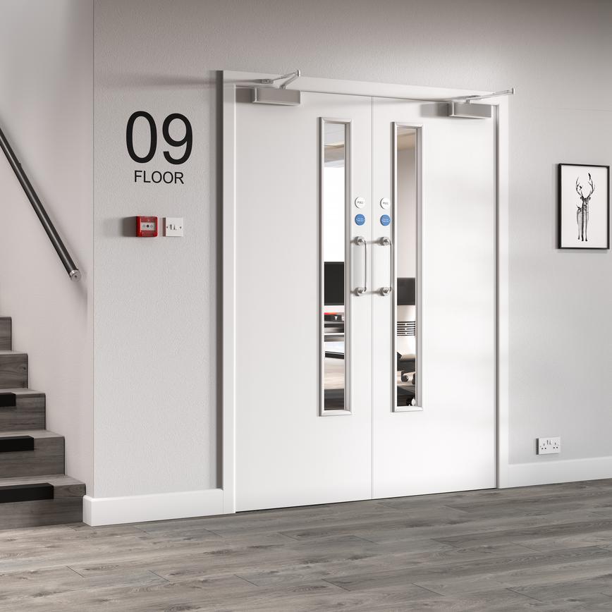 Spey Ply Flush 20G Clear Glazed FD30 door in an office